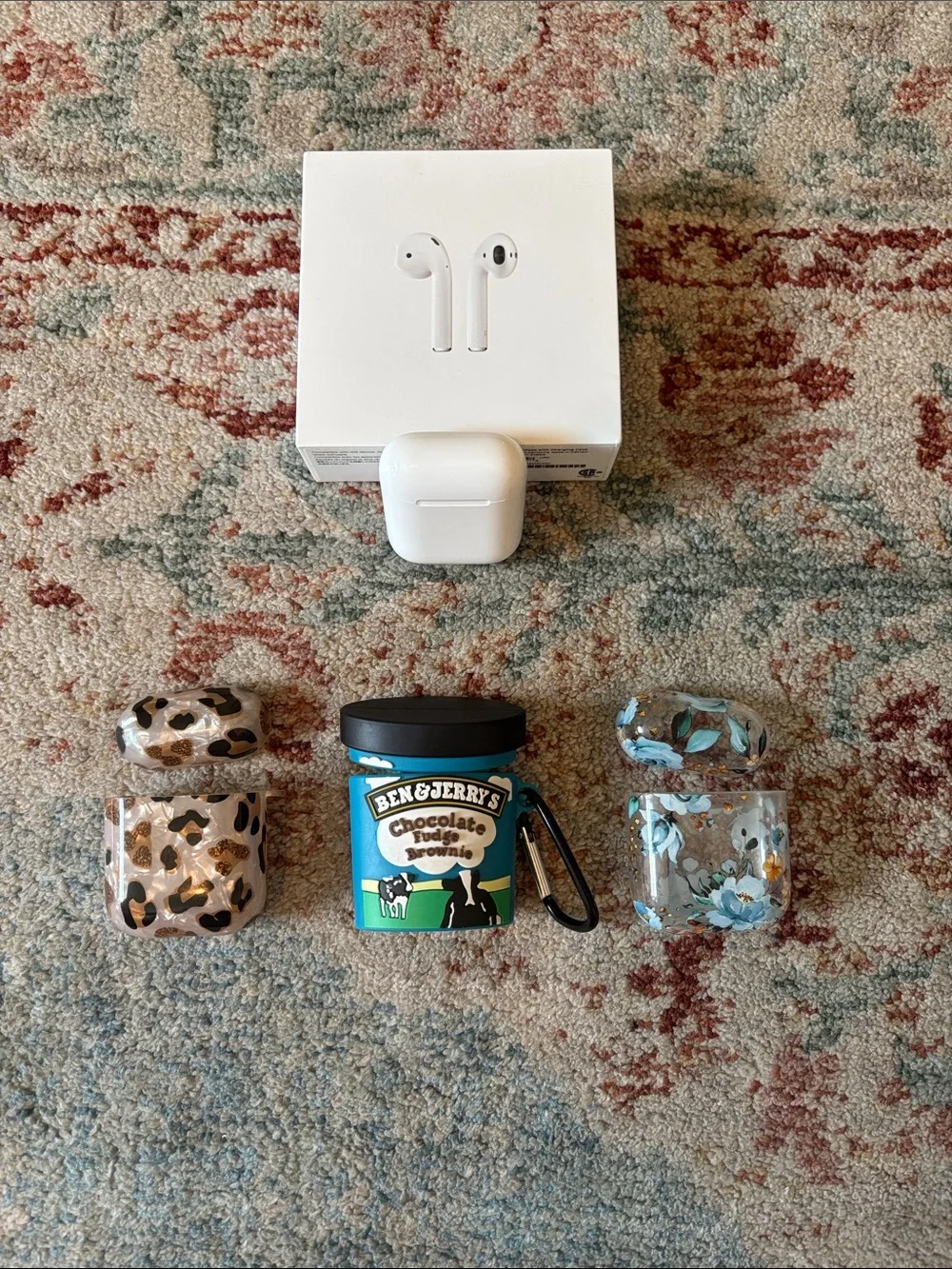 Apple White AirPods with Patterned and Floral Protective Cases
